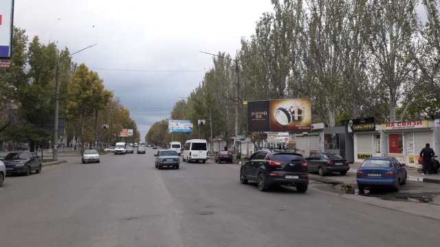 Щит 6x3,  пр.50 річчя Перемоги перехрестя з вул. Гризодубової (біля Ризького ринку), центр

